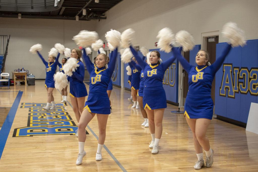 Cheer team performing during a home basketball game